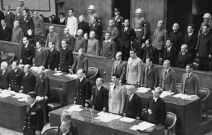 photo of men in military uniform in an assembly room
