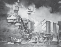 Image showing burning American battleships in the water following the Pearl Harbor attacks. The intense flames engulf the ships, while small rescue boats approach the burning vessels.