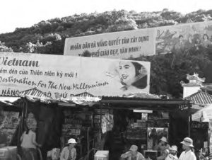 a billboard with a woman and "Vietnam" on it