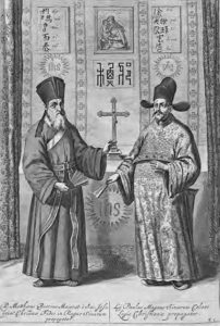 two men in elaborate robes stand in between a cross